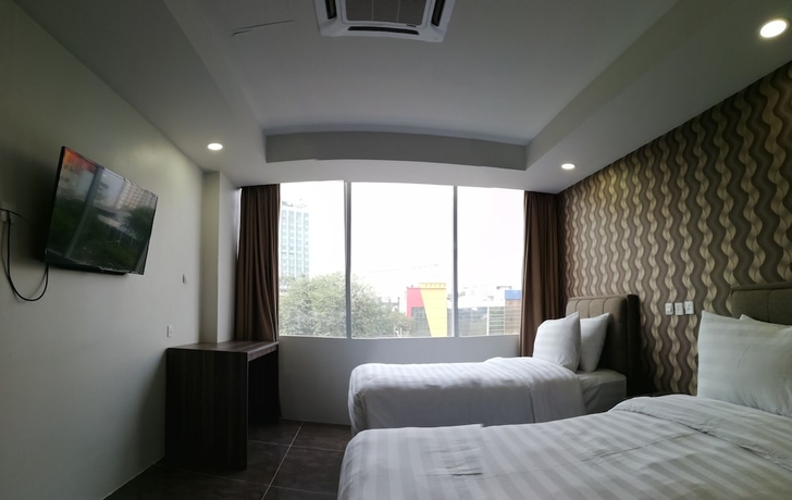 Imagen de la habitación del Hotel Win Premier Mangga Besar. Foto 10