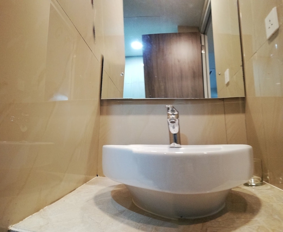 Imagen de la habitación del Hotel Win Premier Mangga Besar. Foto 11