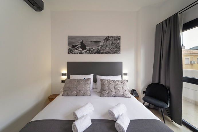 Imagen de la habitación del Hotel Winahost Hostal Boutique Pozo Esparto. Foto 3