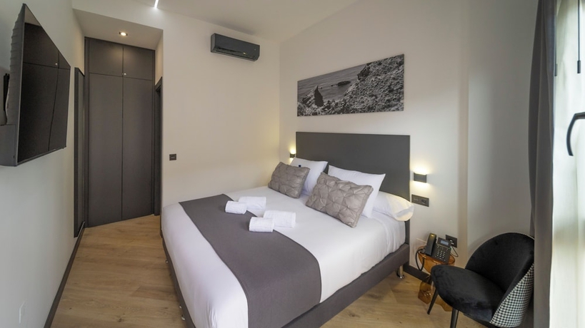 Imagen de la habitación del Hotel Winahost Hostal Boutique Pozo Esparto. Foto 11