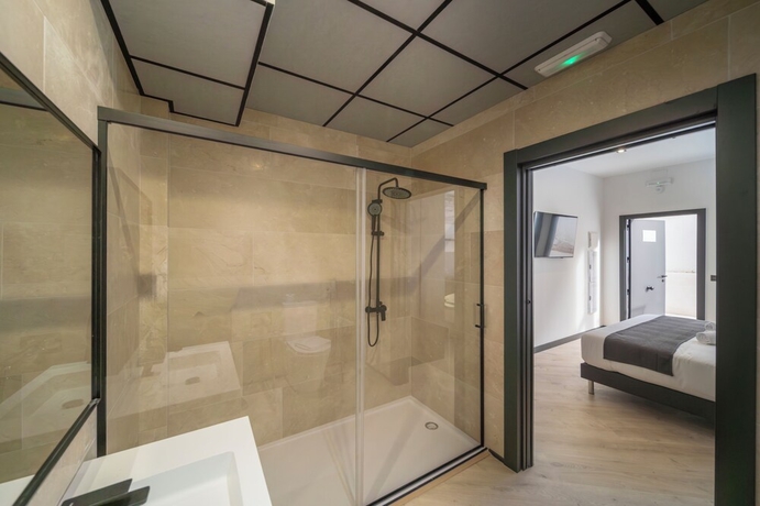 Imagen de la habitación del Hotel Winahost Hostal Boutique Pozo Esparto. Foto 13