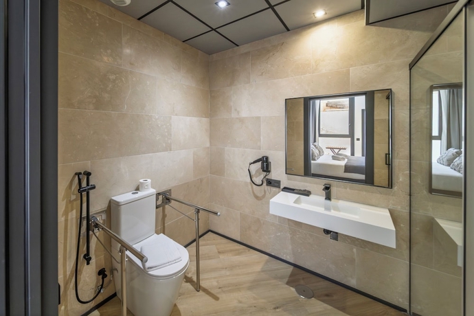 Imagen de la habitación del Hotel Winahost Hostal Boutique Pozo Esparto. Foto 14