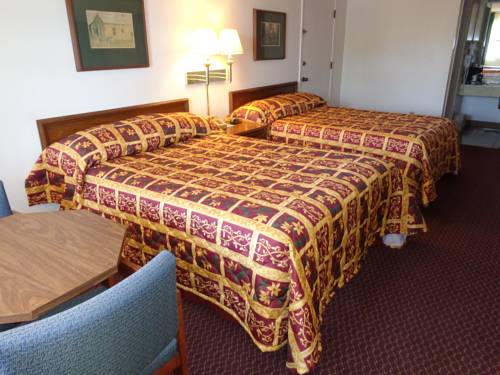 Imagen de la habitación del Hotel Windcrest Inn and Suites. Foto 1