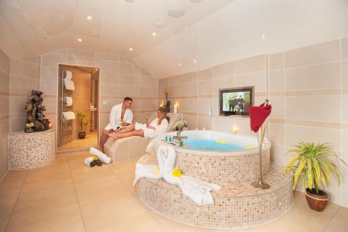 Imagen de la habitación del Hotel Windermere Boutique Spa Suites & Hot Tubs. Foto 7