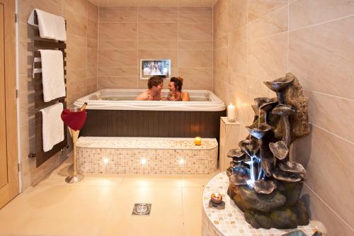 Imagen de la habitación del Hotel Windermere Boutique Spa Suites & Hot Tubs. Foto 9