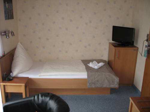 Imagen de la habitación del Hotel Windjammer, B&uuml;sum. Foto 9