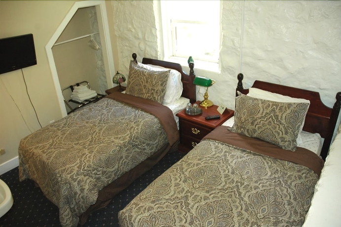 Imagen de la habitación del Hotel Windsor Guest House. Foto 12
