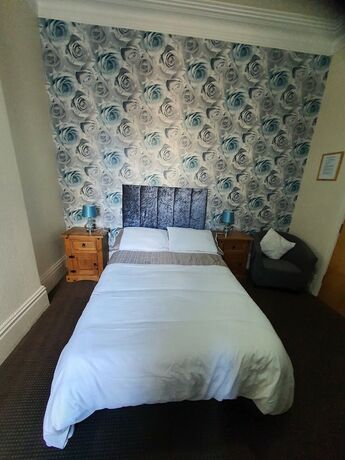 Imagen de la habitación del Hotel Windsor House. Foto 11