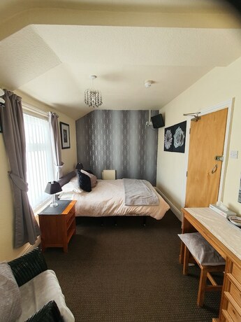Imagen de la habitación del Hotel Windsor House. Foto 13