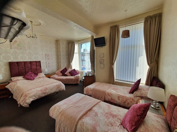 Imagen de la habitación del Hotel Windsor House. Foto 16
