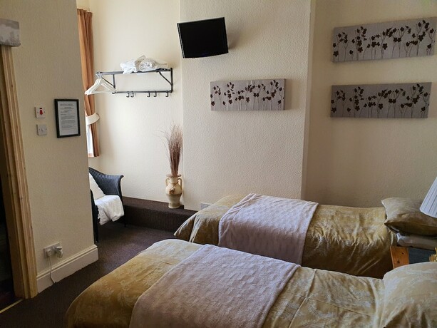 Imagen de la habitación del Hotel Windsor House. Foto 18