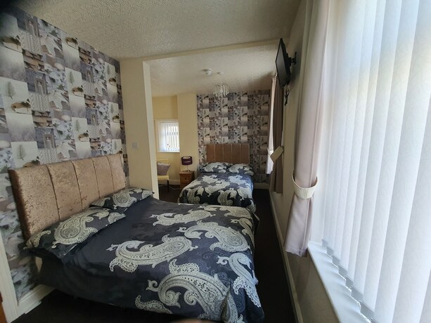 Imagen de la habitación del Hotel Windsor House. Foto 19
