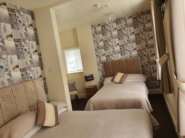 Imagen de la habitación del Hotel Windsor House. Foto 20