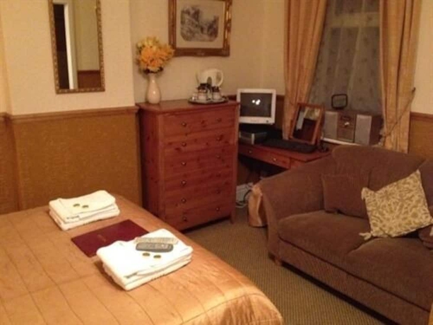 Imagen de la habitación del Hotel Windsor House - Guest House. Foto 5