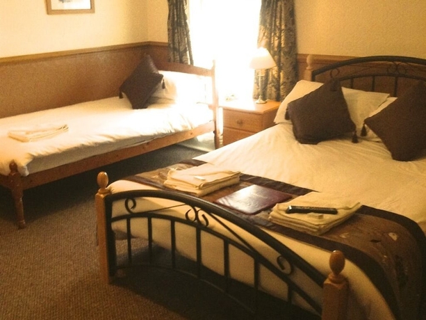 Imagen de la habitación del Hotel Windsor House - Guest House. Foto 11