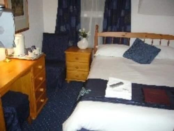 Imagen de la habitación del Hotel Windsor House - Guest House. Foto 12