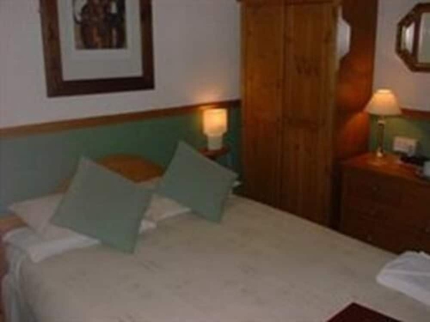 Imagen de la habitación del Hotel Windsor House - Guest House. Foto 16