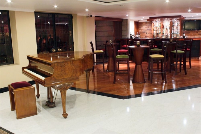 Imagen de los interiores del Hotel Windsor House Inn By GEH Suites. Foto 7