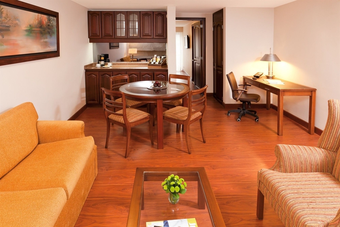 Imagen de los interiores del Hotel Windsor House Inn By GEH Suites. Foto 9