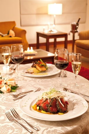 Imagen de la habitación del Hotel Windsor House Inn By GEH Suites. Foto 5