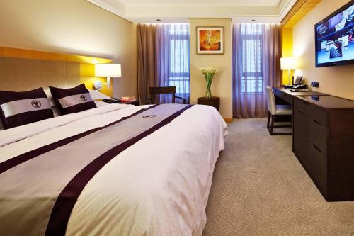 Imagen de la habitación del Hotel Windsor Park Kunshan. Foto 7