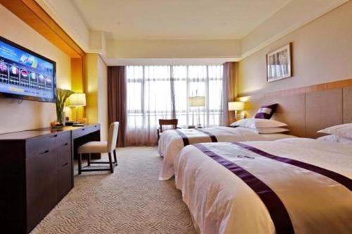 Imagen de la habitación del Hotel Windsor Park Kunshan. Foto 8