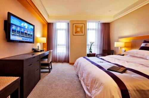 Imagen de la habitación del Hotel Windsor Park Kunshan. Foto 9