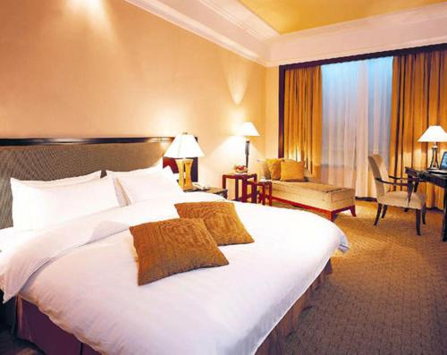 Imagen de la habitación del Hotel Windsor Park Kunshan. Foto 10