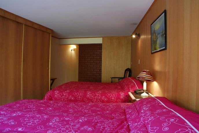Imagen de la habitación del Hotel Windsor Suites. Foto 1
