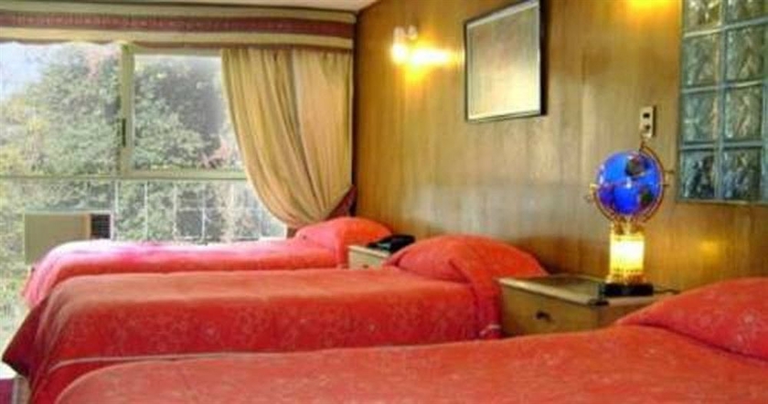 Imagen de la habitación del Hotel Windsor Suites. Foto 6