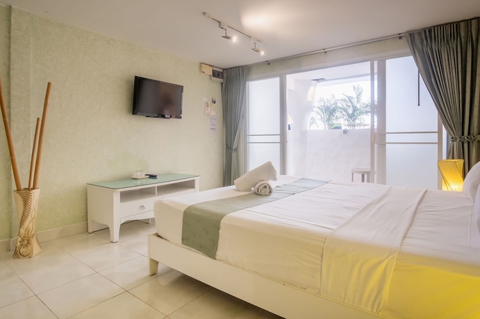 Imagen de la habitación del Hotel Windy Inn. Foto 3