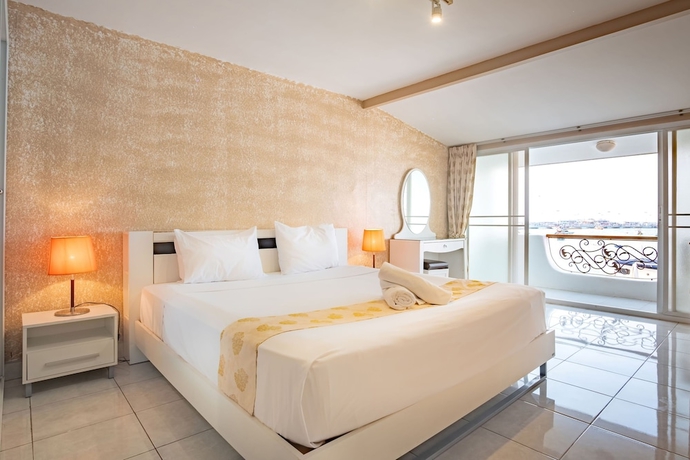 Imagen de la habitación del Hotel Windy Inn. Foto 4