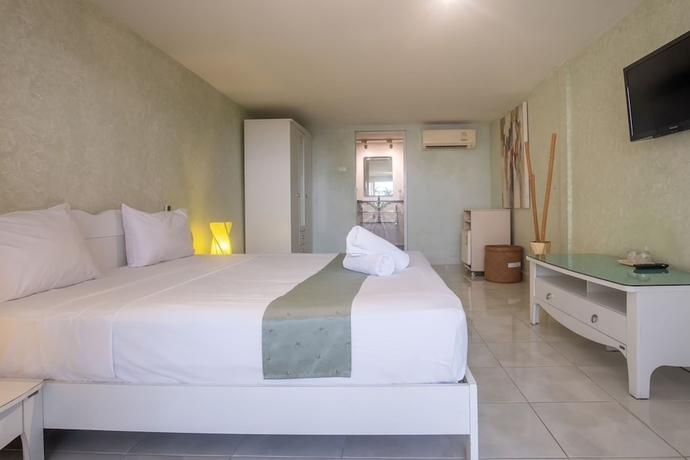Imagen de la habitación del Hotel Windy Inn. Foto 17