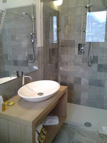 Imagen de la habitación del Hotel Wine Retici Balzi. Foto 5