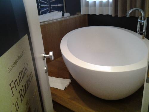 Imagen de la habitación del Hotel Wine Retici Balzi. Foto 11