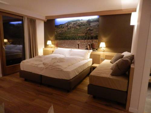 Imagen de la habitación del Hotel Wine Retici Balzi. Foto 12