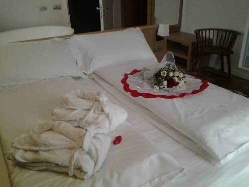 Imagen de la habitación del Hotel Wine Retici Balzi. Foto 14