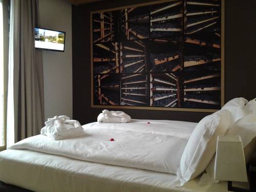 Imagen de la habitación del Hotel Wine Retici Balzi. Foto 16