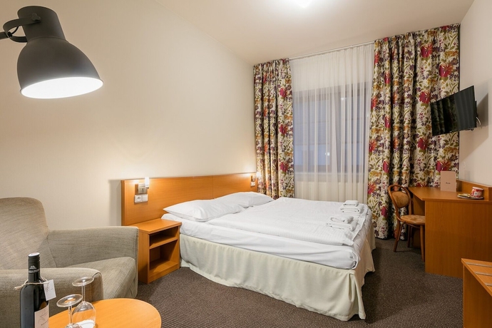 Imagen de la habitación del Hotel Wine Wellness Amande. Foto 13