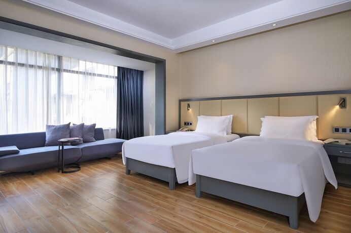 Imagen de la habitación del Hotel Wing Guilin - Central Square. Foto 13