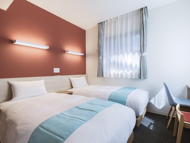 Imagen de la habitación del Hotel Wing International Hakata Shinkansenguchi. Foto 8