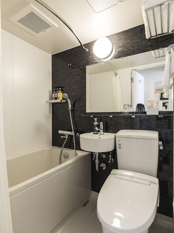 Imagen de la habitación del Hotel Wing International Hakata Shinkansenguchi. Foto 9