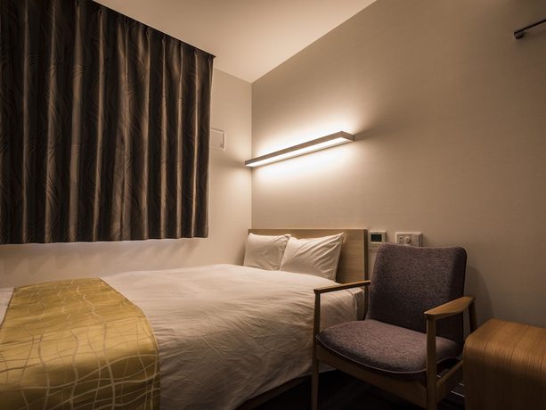 Imagen de la habitación del Hotel Wing International Hakata Shinkansenguchi. Foto 12