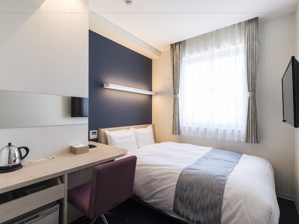 Imagen de la habitación del Hotel Wing International Hakata Shinkansenguchi. Foto 13