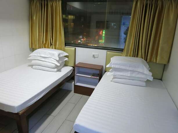 Imagen de la habitación del Hotel Wing On. Foto 9