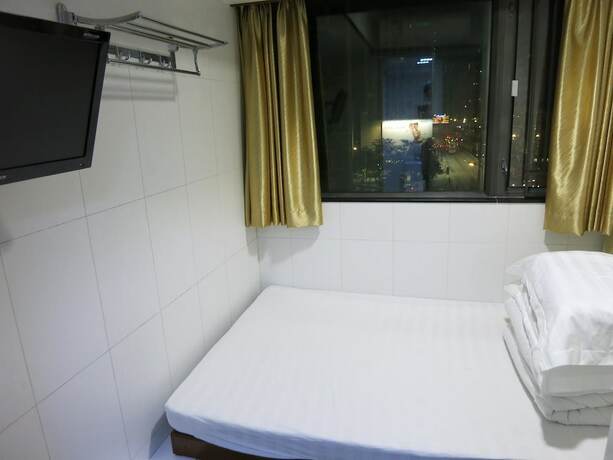 Imagen de la habitación del Hotel Wing On. Foto 14