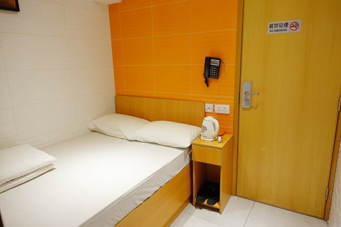 Imagen de la habitación del Hotel Wing Sing Hong Guesthouse. Foto 14