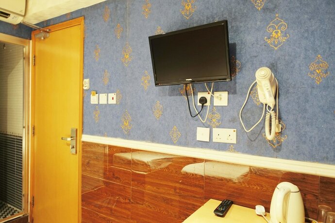 Imagen de la habitación del Hotel Wing Sing Hong Guesthouse. Foto 17