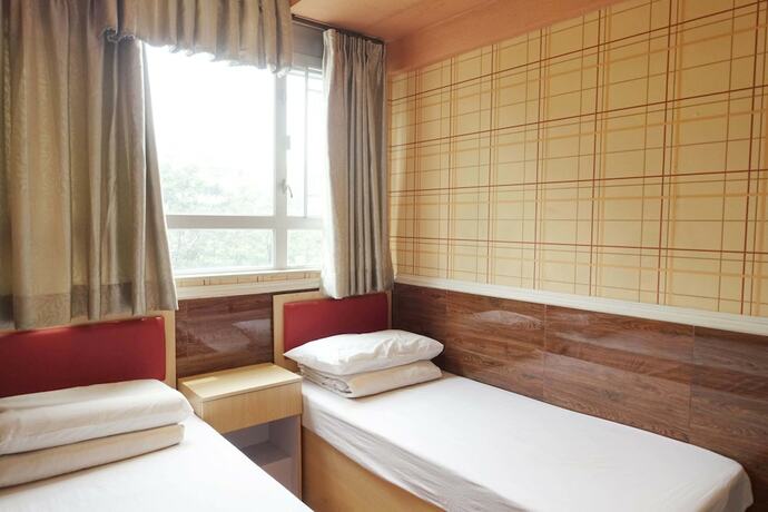 Imagen de la habitación del Hotel Wing Sing Hong Guesthouse. Foto 19