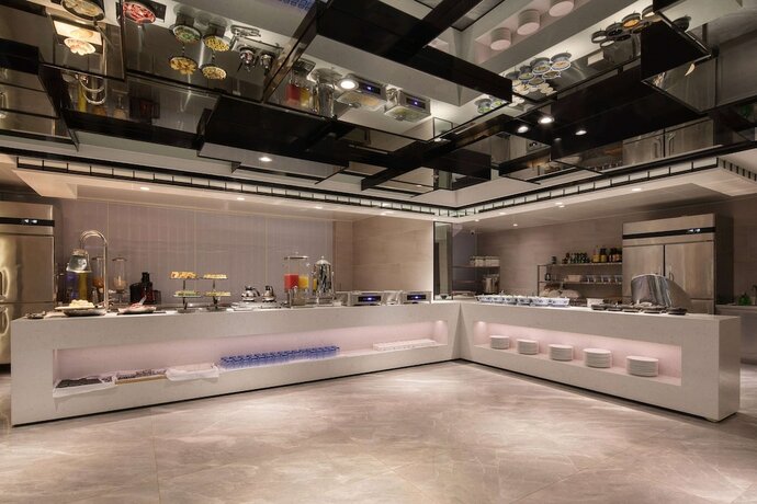 Imagen del bar/restaurante del Hotel Wingate By Wyndham Xishuangbanna. Foto 13